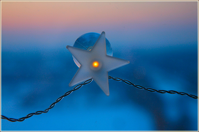Фото звезд. Звезда на стекле на фоне заката
